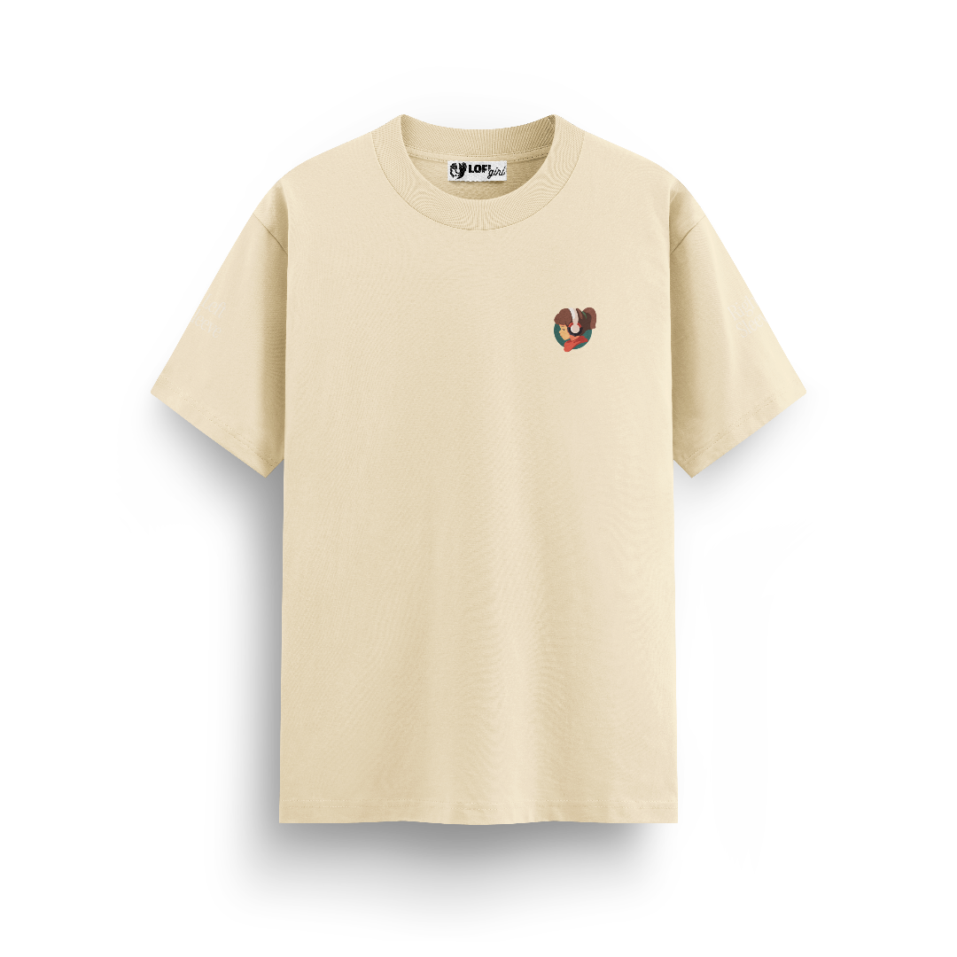 Beige t-shirt with a small graphic on a white background