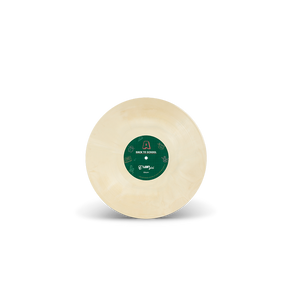 
                  
                    Round beige object with a green label on a white background
                  
                