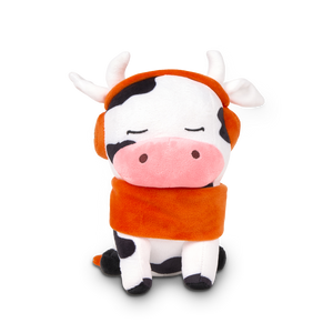 
                  
                    Plush toy cow with an orange scarf on a white background
                  
                