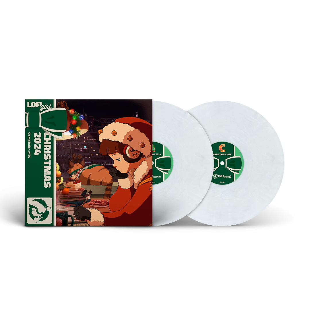 Vinyl records with a Christmas-themed cover featuring a person in a Santa hat and dog.