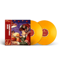 Orange vinyl records with a colorful packaging featuring an illustration of a person in a festive outfit.