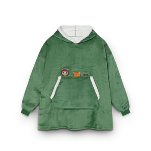 
                  
                    Green fleece poncho with cartoon character patches on a white background
                  
                