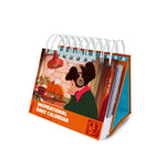 Lofi Girl 2025 inspirational daily calendar featuring the iconic Lofi Girl wearing headphones, studying by a cozy window scene. The calendar has a spiral binding and a stand for easy display.