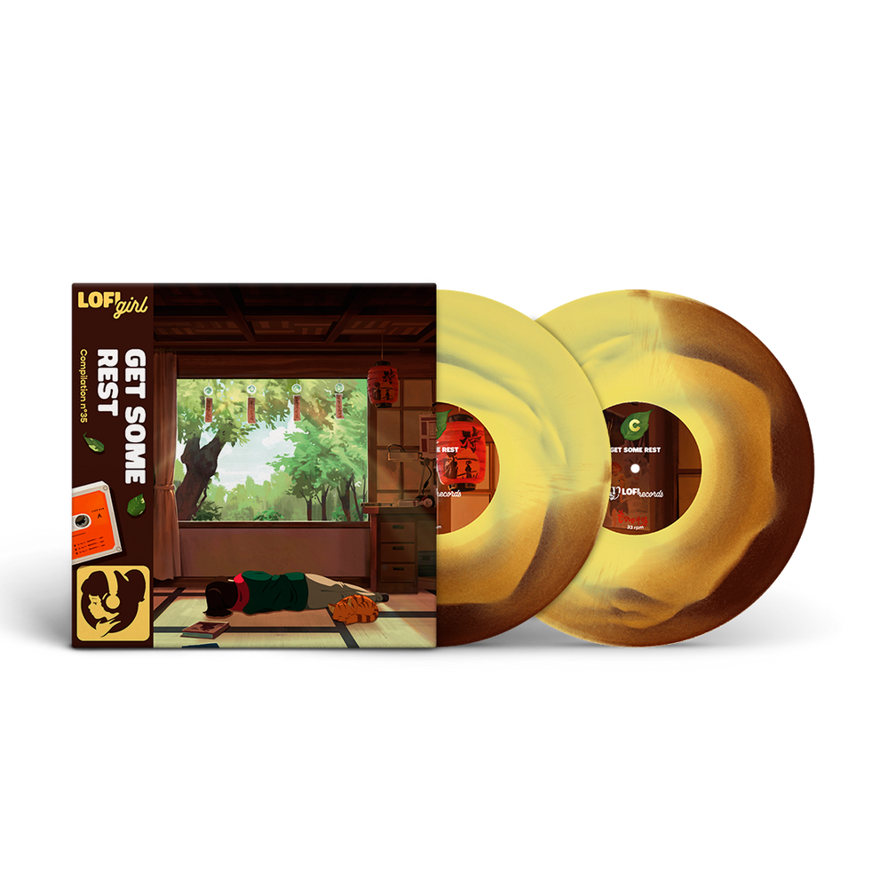 Vinyl record with a colorful cover featuring a nature scene and album art.