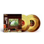 Vinyl record with a colorful cover featuring a nature scene and album art.