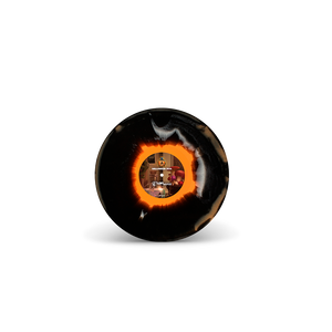 
                  
                    Black and orange spherical object on a white background
                  
                