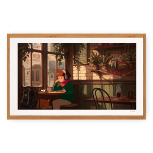 
                  
                    Framed artwork of a woman sitting at a table in a cozy café.
                  
                
