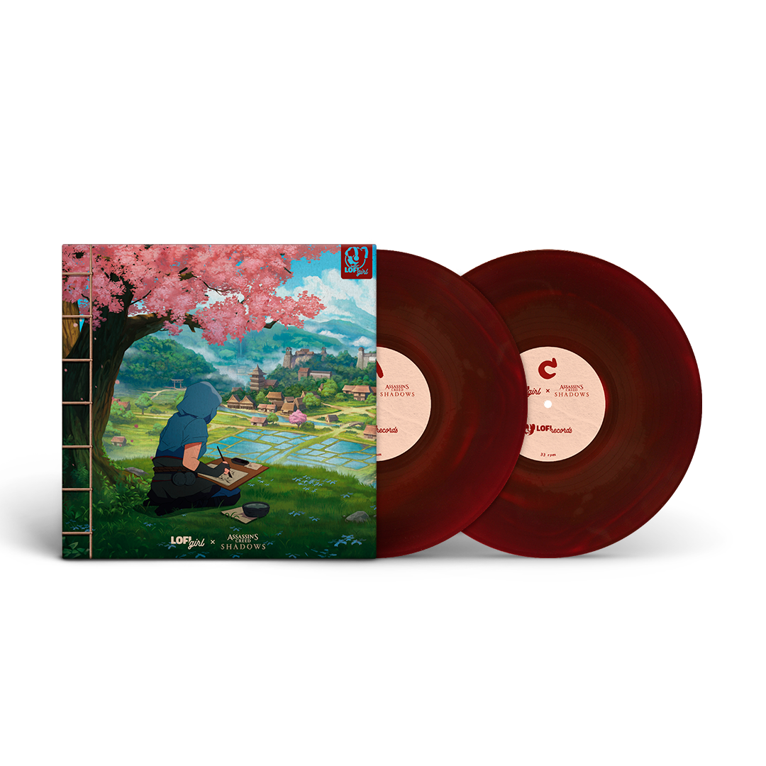 Vinyl records with a colorful cover featuring a person under cherry blossoms.