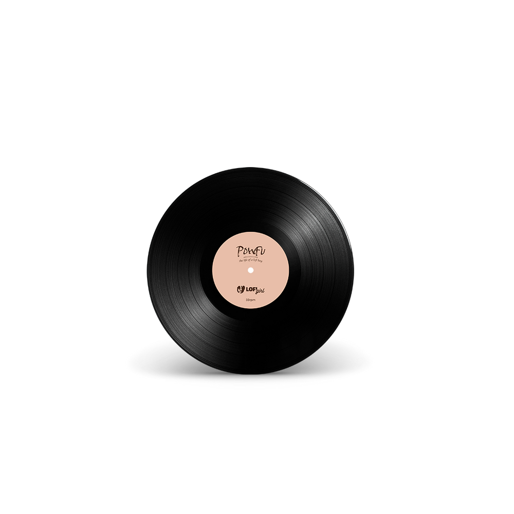 
                  
                    Black vinyl record with a pink label on a white background
                  
                