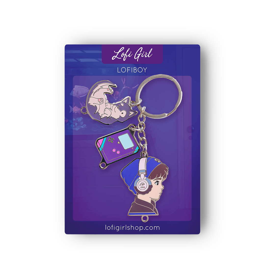 Keychain with cartoon character and phone design on a purple card with 'Lofi Girl' branding.