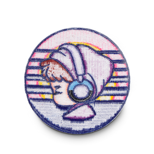 
                  
                    Circular patch with a cartoon character wearing headphones on a white background
                  
                