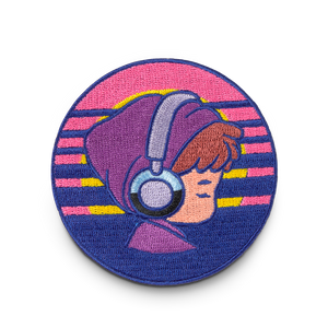 
                  
                    Circular patch with a stylized illustration of a person wearing headphones against a colorful striped background.
                  
                