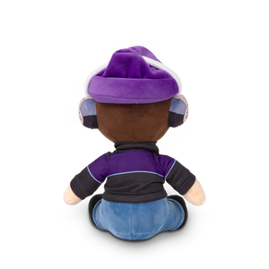
                  
                    Plush toy with purple outfit and helmet on a white background
                  
                