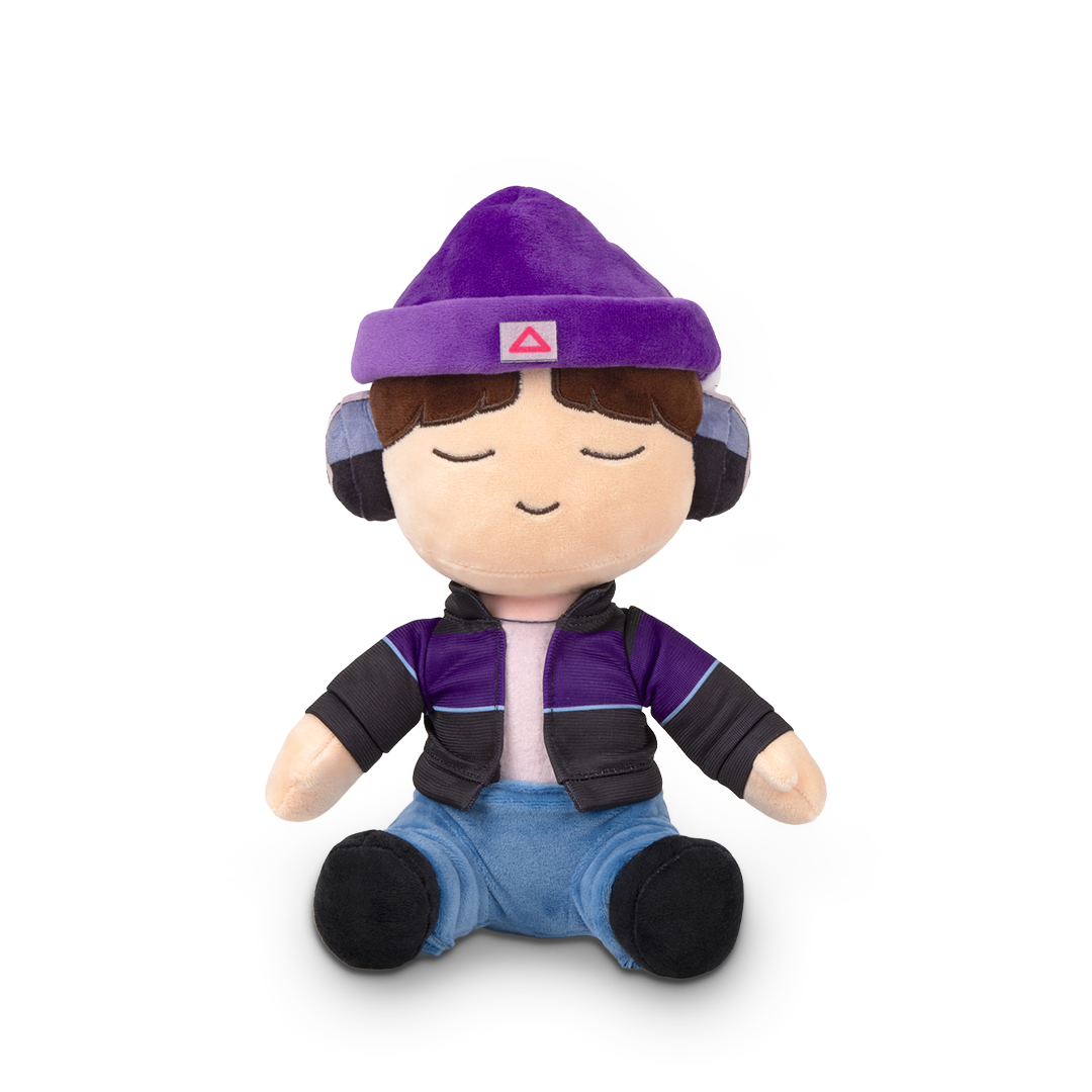 Plush toy with a purple outfit and hat on a white background