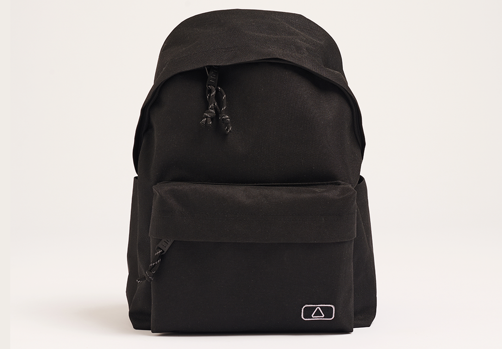 A front view of a simple black backpack with a small white Lofi Girl logo on the front pocket, against a plain background.