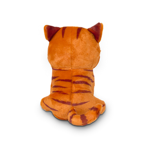 
                  
                    Plush tiger toy on a white background
                  
                