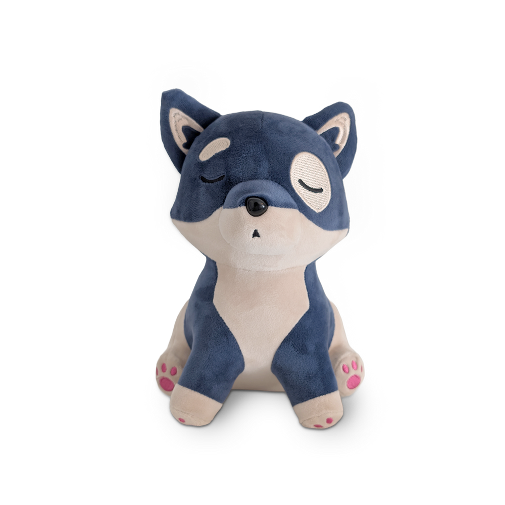 Plush toy fox with blue fur on a white background
