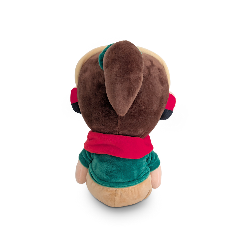 
                  
                    Plush toy with a red shirt and green pants on a white background
                  
                