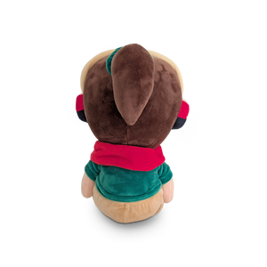 
                  
                    Plush toy with a red shirt and green pants on a white background
                  
                