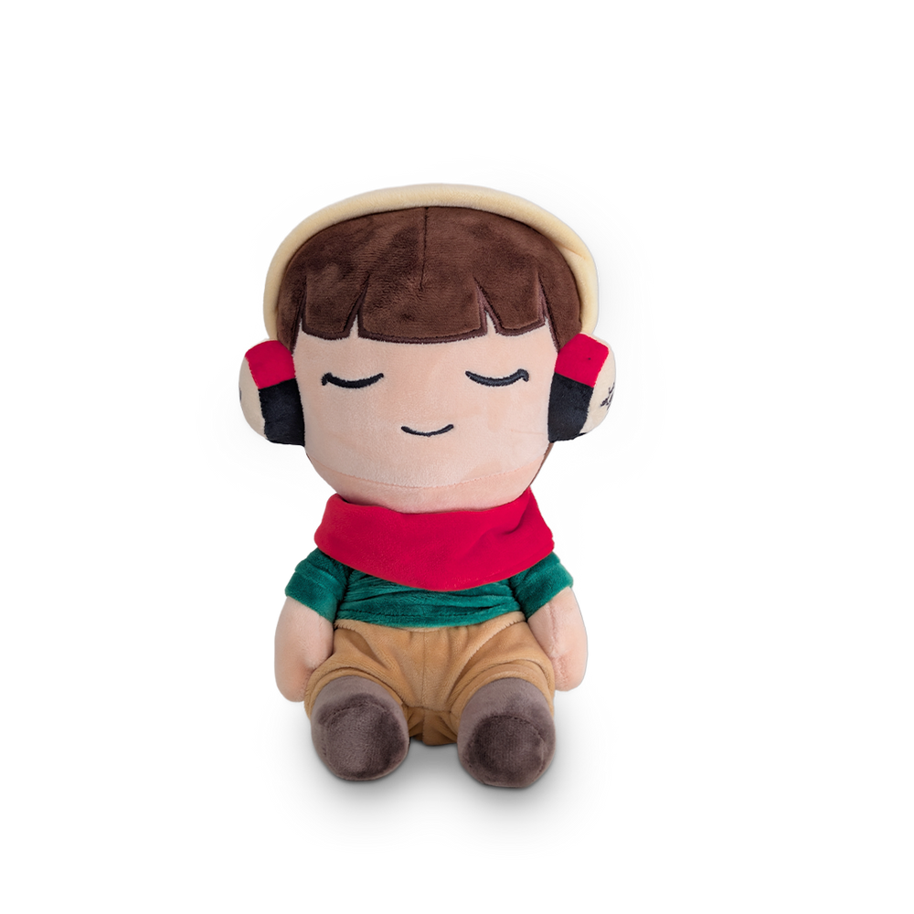 Plush toy with a child-like face wearing headphones on a white background