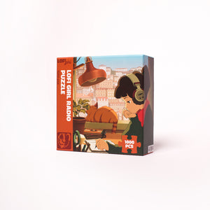 
                  
                    Side view of the Lofi Girl Radio Puzzle box, showcasing the same iconic artwork and branding, highlighting the 1000-piece count.
                  
                