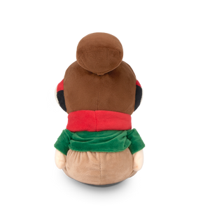 
                  
                    Plush toy with a brown body, red shirt, and green pants on a white background
                  
                