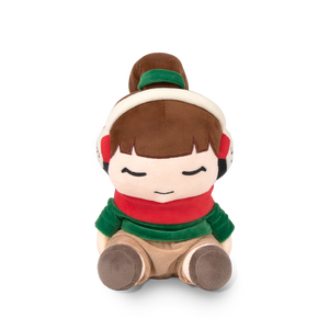 
                  
                    Plush toy of a girl with brown hair, wearing a green headband, red scarf, and brown shoes on a white background.
                  
                