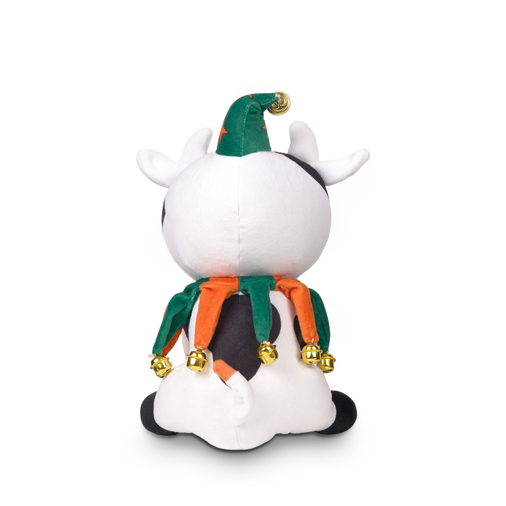 
                  
                    White plush toy with green and orange accents on a white background
                  
                