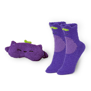 
                  
                    Pair of purple socks with a matching eye mask on a white background
                  
                