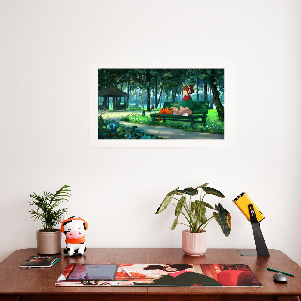 Lofi Girl print on a wall above a desk setup with plants and a plush toy, creating a cozy and serene workspace.