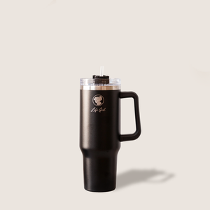 
                  
                    A black travel tumbler with the Lofi Girl logo on it. The tumbler is standing upright on a light beige background, showcasing its sleek design, handle, and transparent lid with a straw.
                  
                