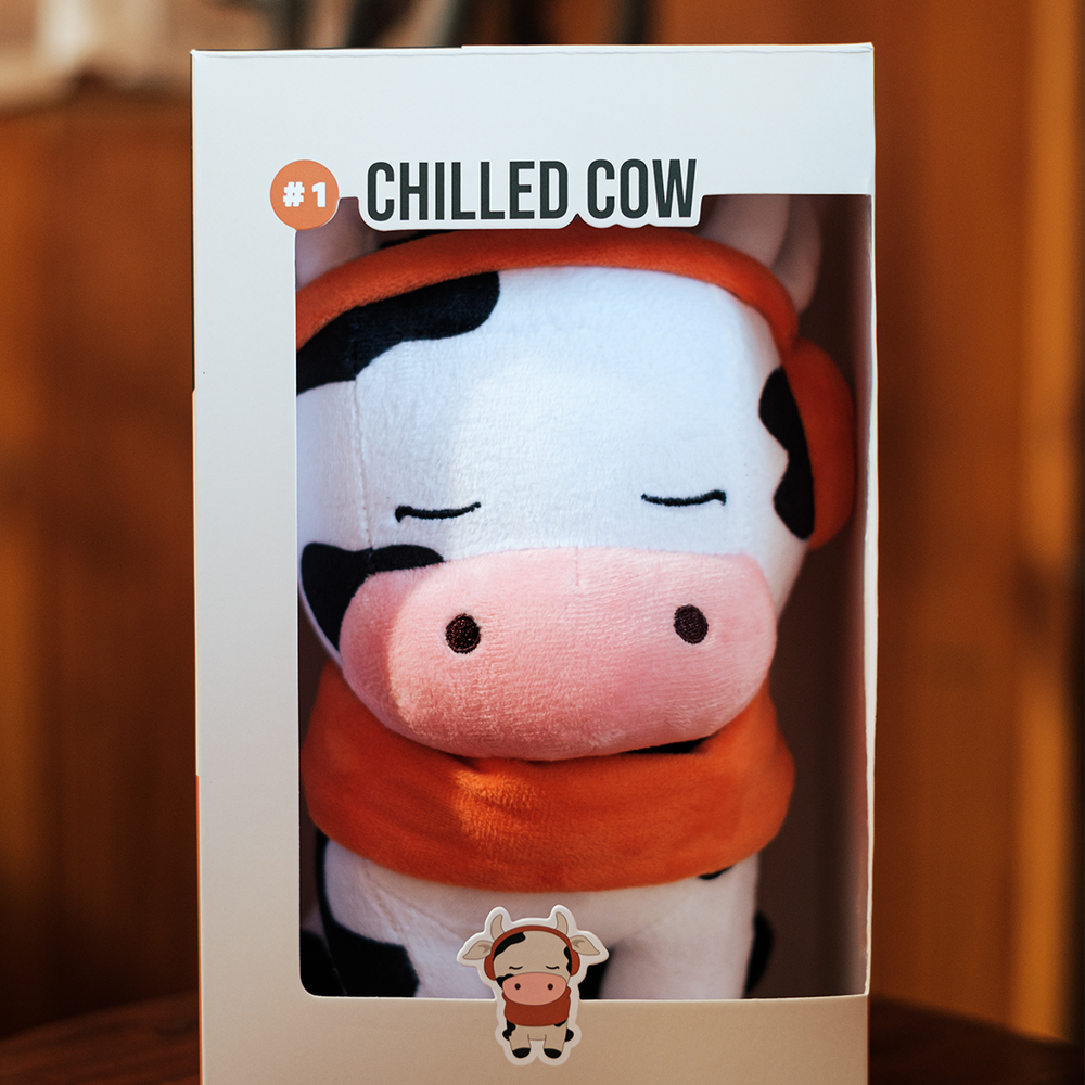 
                  
                    Featured in its unique packaging, the Chilled Cow plushie is ready to be the star of any collection. The box design complements the plushie's theme, making it a great display piece.
                  
                